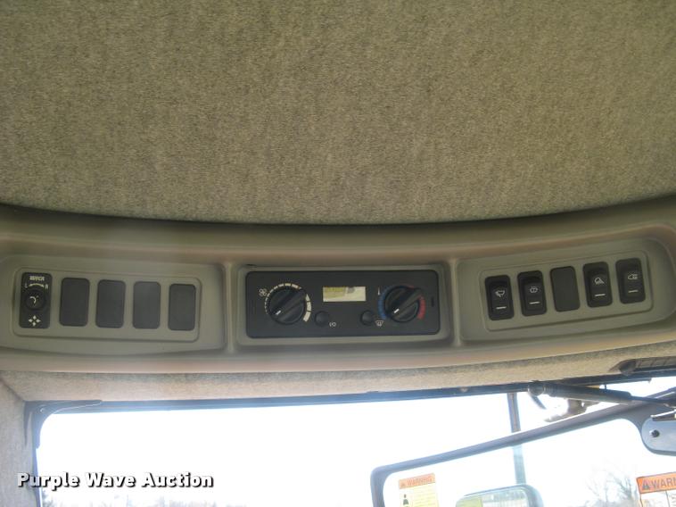 image for item L3940 2011 New Holland H8060 self-propelled windrower