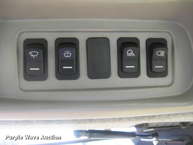 image for item L3940 2011 New Holland H8060 self-propelled windrower