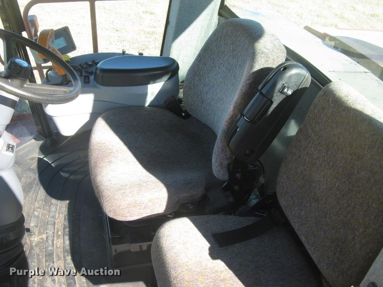 image for item L3940 2011 New Holland H8060 self-propelled windrower