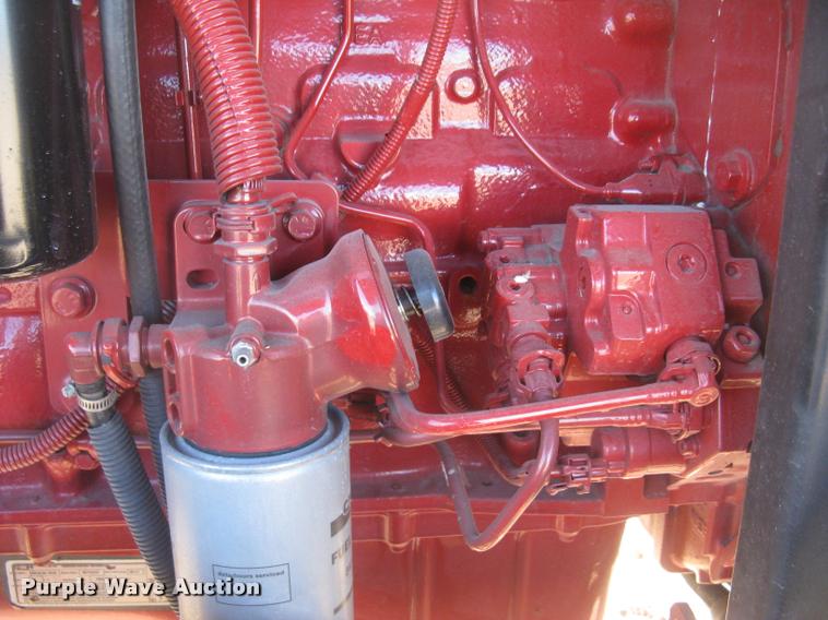 image for item L3940 2011 New Holland H8060 self-propelled windrower