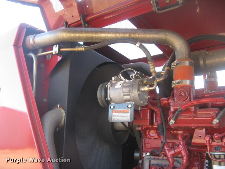 image for item L3940 2011 New Holland H8060 self-propelled windrower