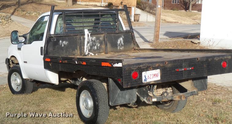 image for item DB0729 2007 Ford F350 Super Duty flatbed pickup truck