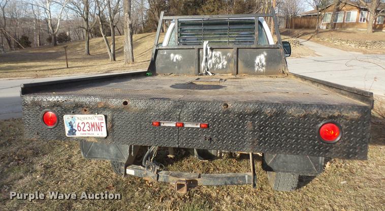 image for item DB0729 2007 Ford F350 Super Duty flatbed pickup truck