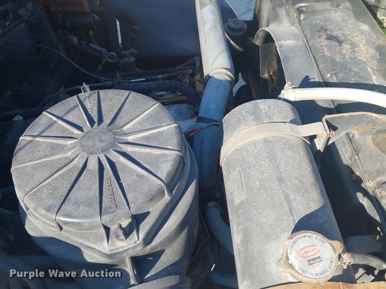 image for item DB1510 1990 GMC TopKick flatbed truck