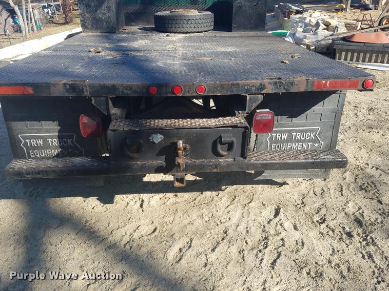 image for item DB1510 1990 GMC TopKick flatbed truck
