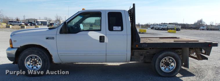 image for item DB2339 2001 Ford F250 XLT SuperCab flatbed pickup truck
