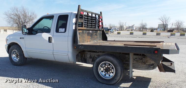 image for item DB2339 2001 Ford F250 XLT SuperCab flatbed pickup truck
