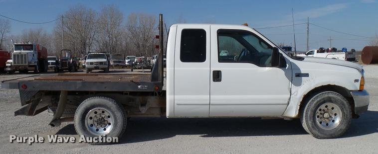 image for item DB2339 2001 Ford F250 XLT SuperCab flatbed pickup truck