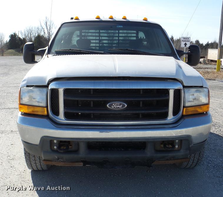 image for item DB2339 2001 Ford F250 XLT SuperCab flatbed pickup truck