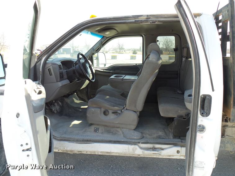 image for item DB2339 2001 Ford F250 XLT SuperCab flatbed pickup truck