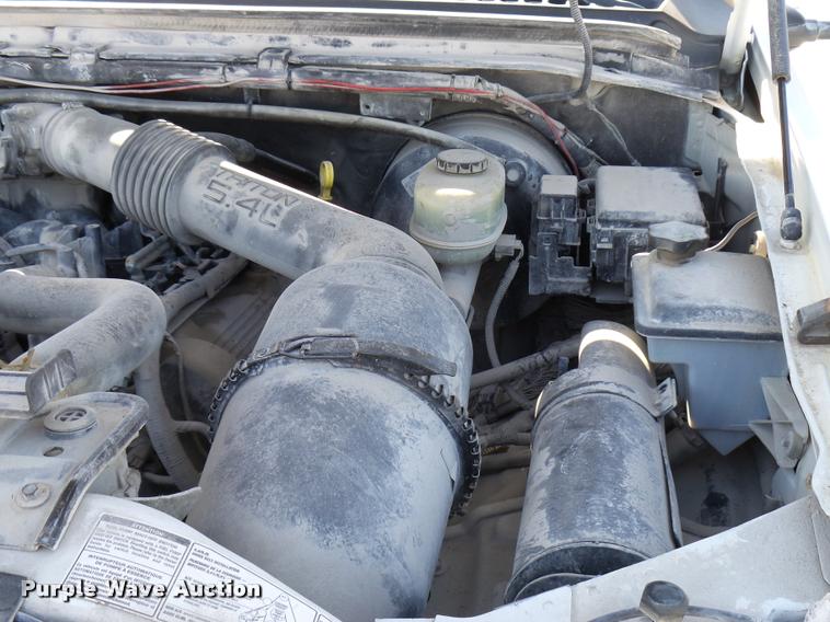 image for item DB2339 2001 Ford F250 XLT SuperCab flatbed pickup truck