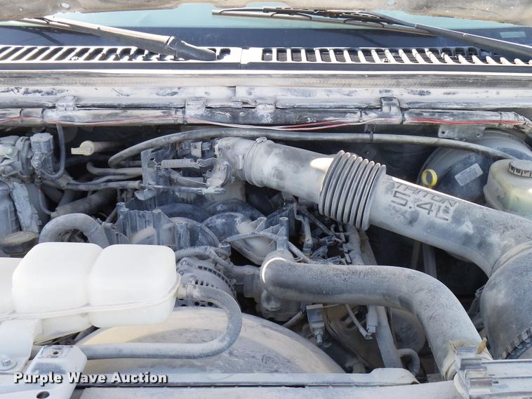 image for item DB2339 2001 Ford F250 XLT SuperCab flatbed pickup truck