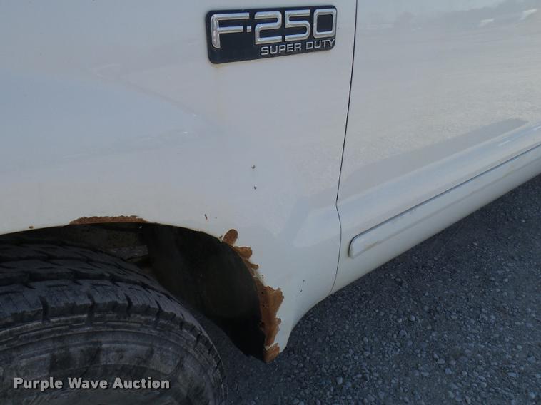 image for item DB2339 2001 Ford F250 XLT SuperCab flatbed pickup truck