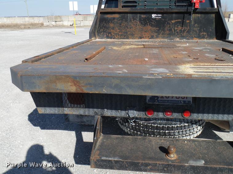 image for item DB2339 2001 Ford F250 XLT SuperCab flatbed pickup truck