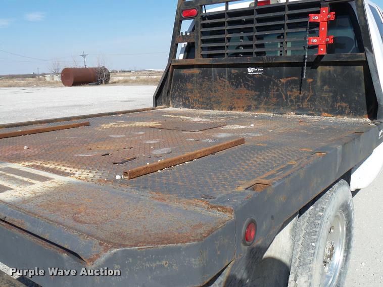 image for item DB2339 2001 Ford F250 XLT SuperCab flatbed pickup truck