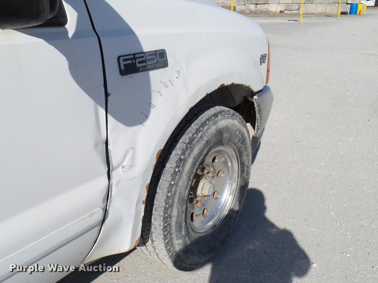 image for item DB2339 2001 Ford F250 XLT SuperCab flatbed pickup truck