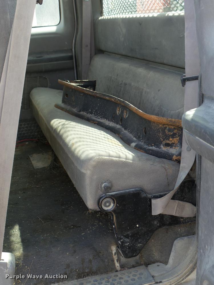 image for item DB2353 1999 Ford F250 Super Duty SuperCab flatbed pickup truck