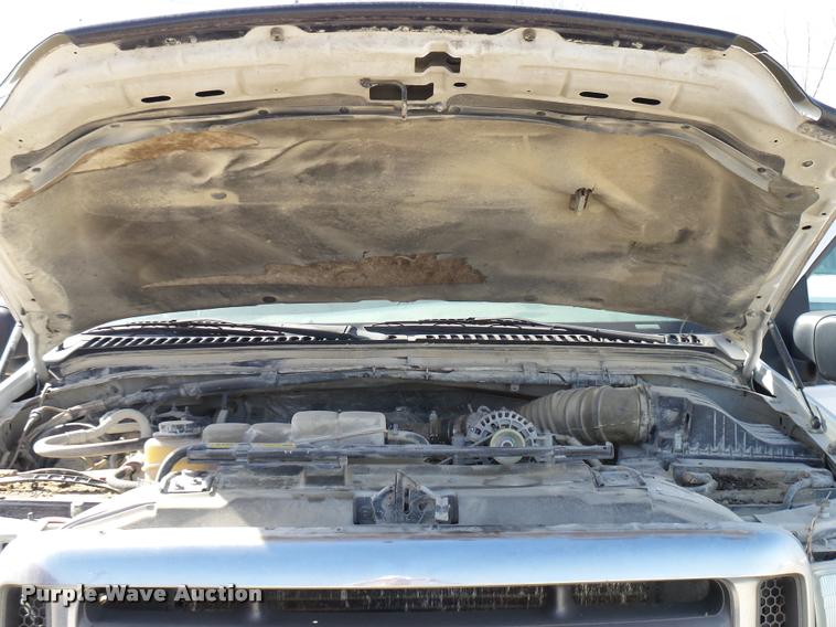 image for item DB2353 1999 Ford F250 Super Duty SuperCab flatbed pickup truck