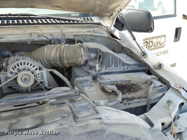 image for item DB2353 1999 Ford F250 Super Duty SuperCab flatbed pickup truck