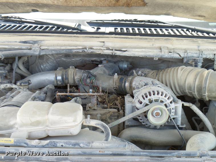 image for item DB2353 1999 Ford F250 Super Duty SuperCab flatbed pickup truck