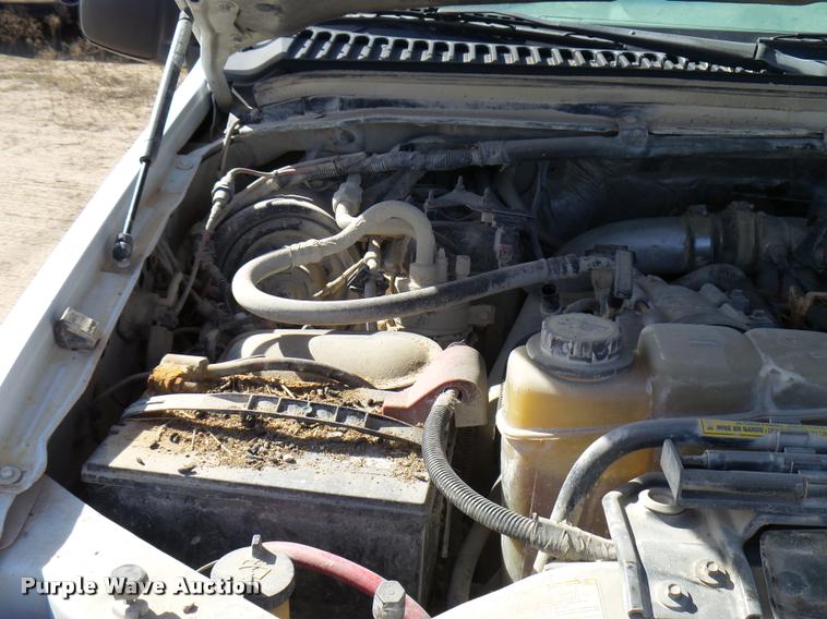 image for item DB2353 1999 Ford F250 Super Duty SuperCab flatbed pickup truck