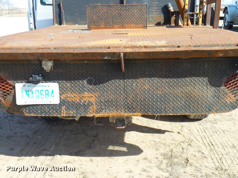 image for item DB2353 1999 Ford F250 Super Duty SuperCab flatbed pickup truck