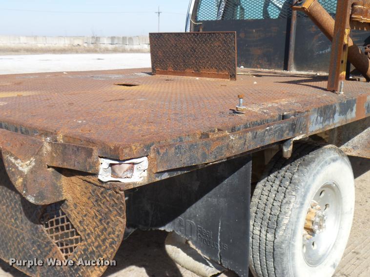 image for item DB2353 1999 Ford F250 Super Duty SuperCab flatbed pickup truck