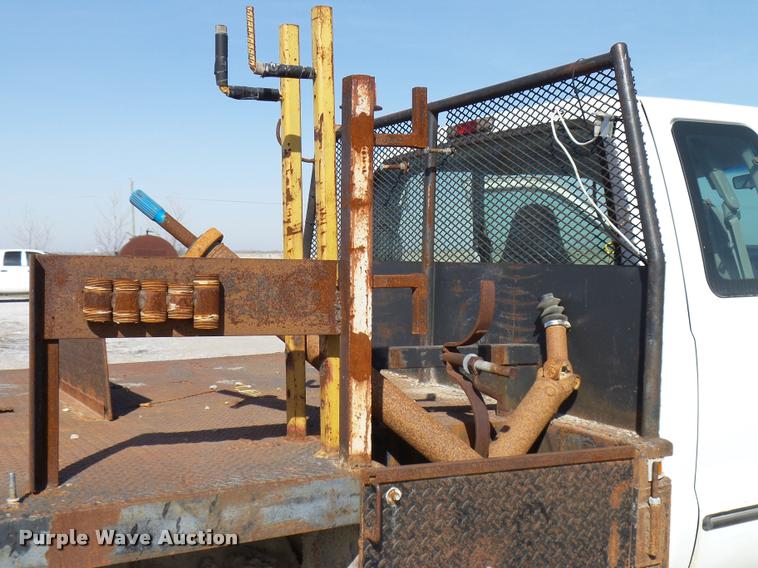 image for item DB2353 1999 Ford F250 Super Duty SuperCab flatbed pickup truck