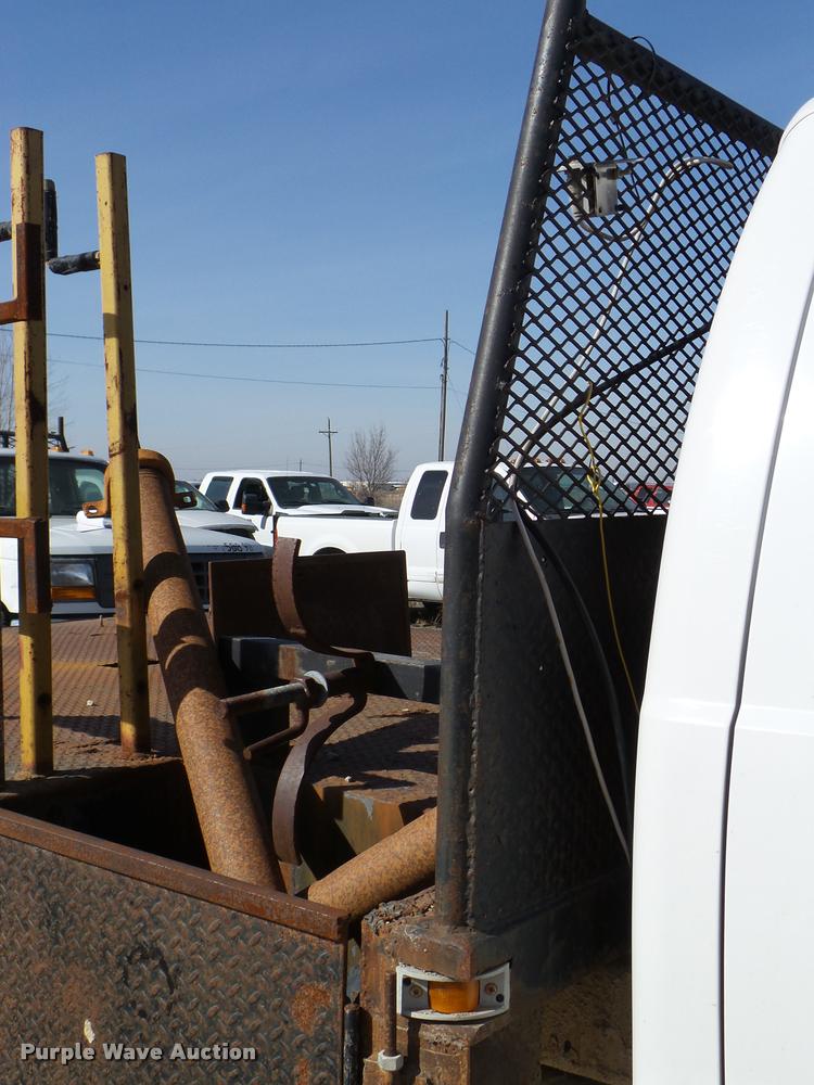 image for item DB2353 1999 Ford F250 Super Duty SuperCab flatbed pickup truck