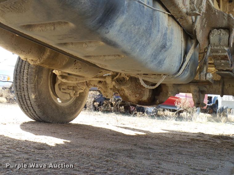 image for item DB2353 1999 Ford F250 Super Duty SuperCab flatbed pickup truck