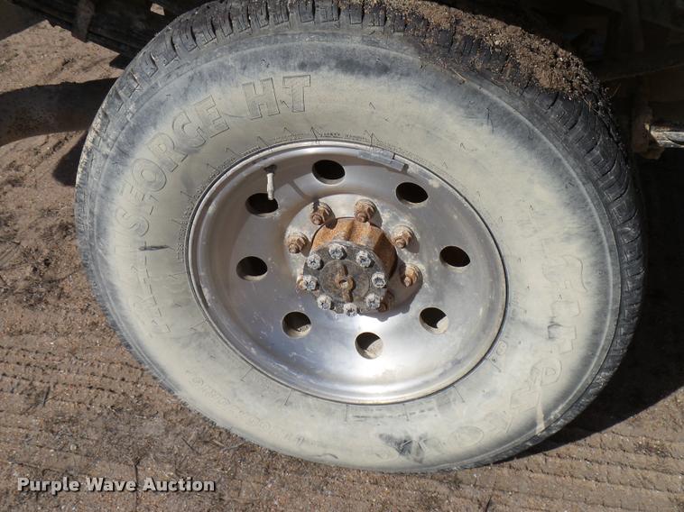 image for item DB2353 1999 Ford F250 Super Duty SuperCab flatbed pickup truck