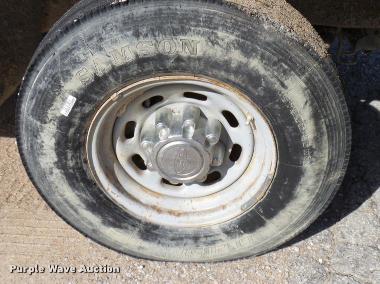 image for item DB2353 1999 Ford F250 Super Duty SuperCab flatbed pickup truck