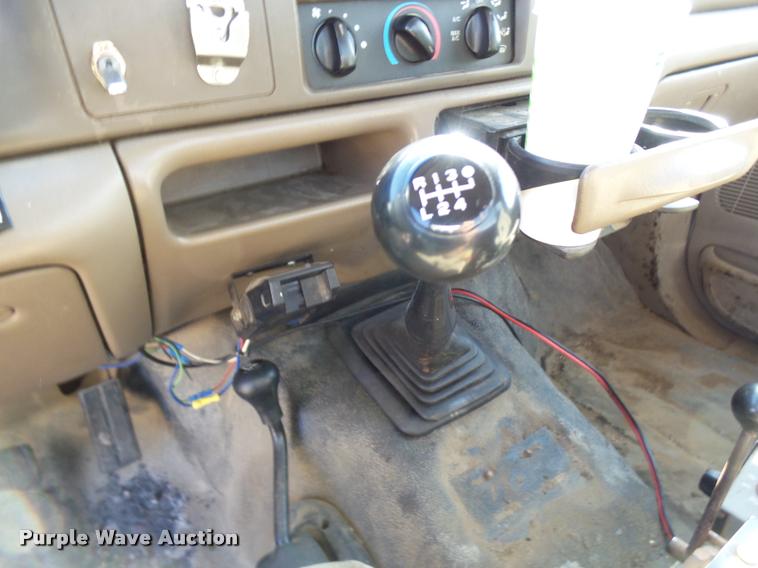 image for item CC9099 2001 Ford F550 Super Duty flat dump bed truck