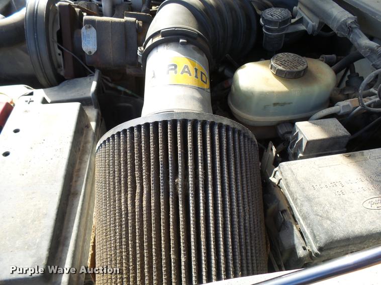 image for item CC9099 2001 Ford F550 Super Duty flat dump bed truck