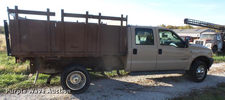 image for item DA3776 2004 Ford F450 Super Duty Crew Cab flatbed dump truck