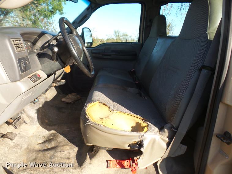 image for item DA3776 2004 Ford F450 Super Duty Crew Cab flatbed dump truck