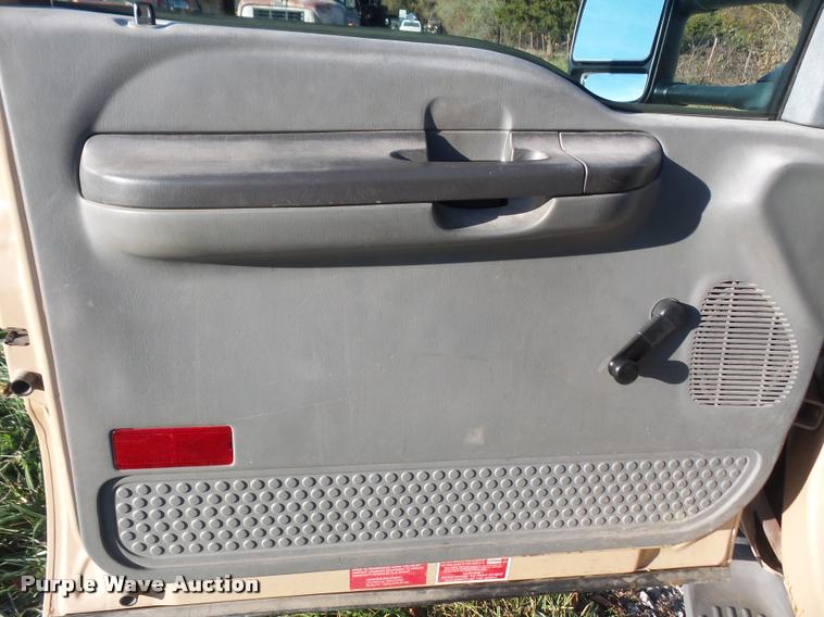 image for item DA3776 2004 Ford F450 Super Duty Crew Cab flatbed dump truck