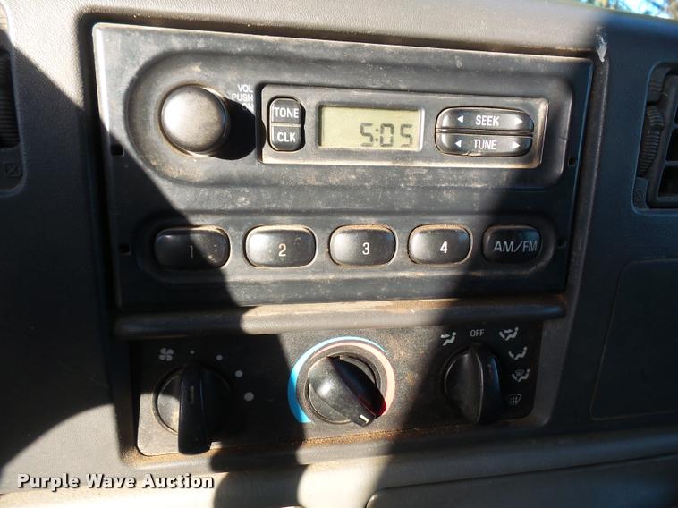 image for item DA3776 2004 Ford F450 Super Duty Crew Cab flatbed dump truck