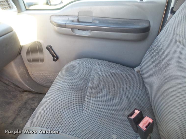 image for item DA3776 2004 Ford F450 Super Duty Crew Cab flatbed dump truck