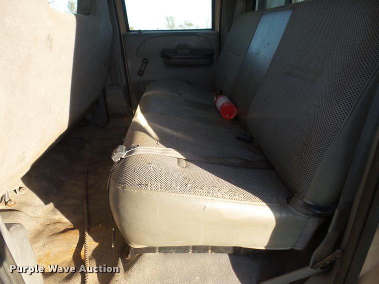 image for item DA3776 2004 Ford F450 Super Duty Crew Cab flatbed dump truck