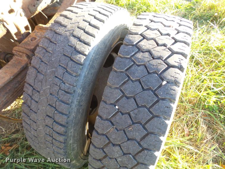 image for item DA3776 2004 Ford F450 Super Duty Crew Cab flatbed dump truck