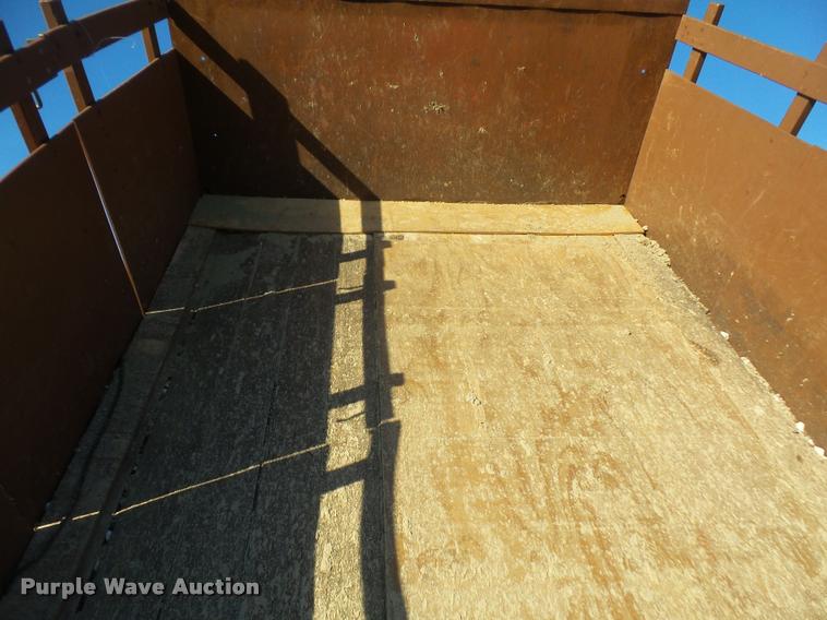 image for item DA3776 2004 Ford F450 Super Duty Crew Cab flatbed dump truck