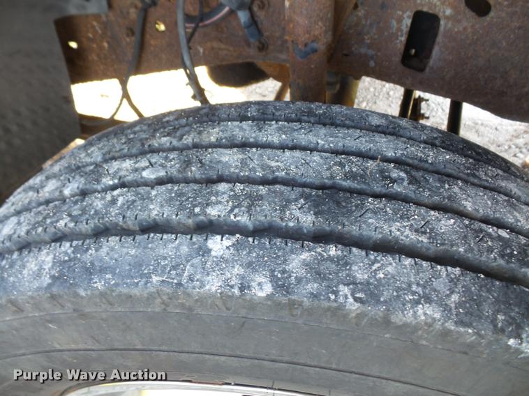 image for item DA3776 2004 Ford F450 Super Duty Crew Cab flatbed dump truck