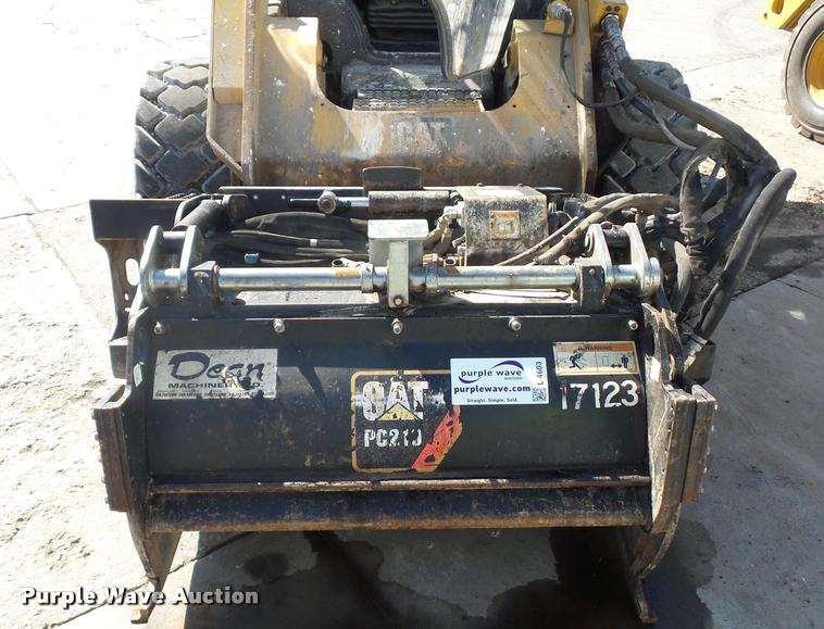 image for item L4603 2011 Caterpillar PC210 skid steer milling attachment