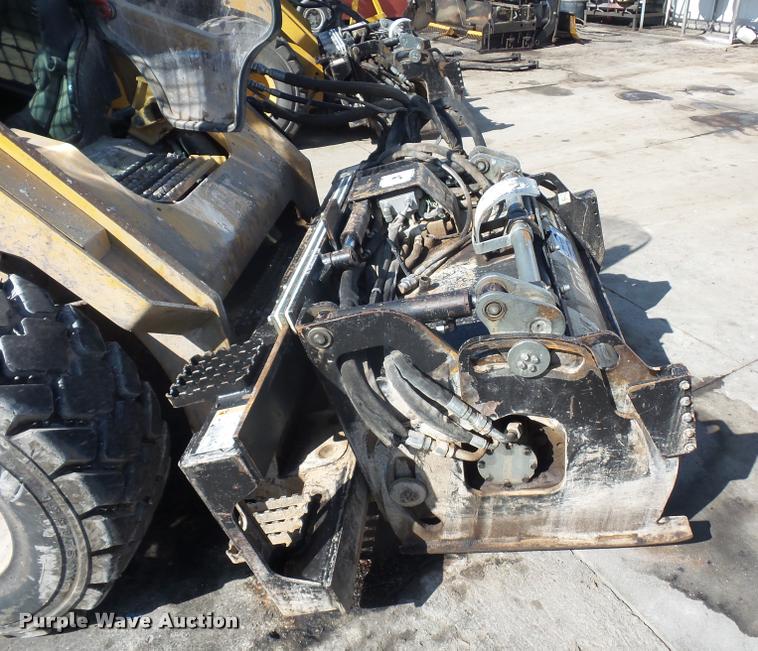 image for item L4603 2011 Caterpillar PC210 skid steer milling attachment