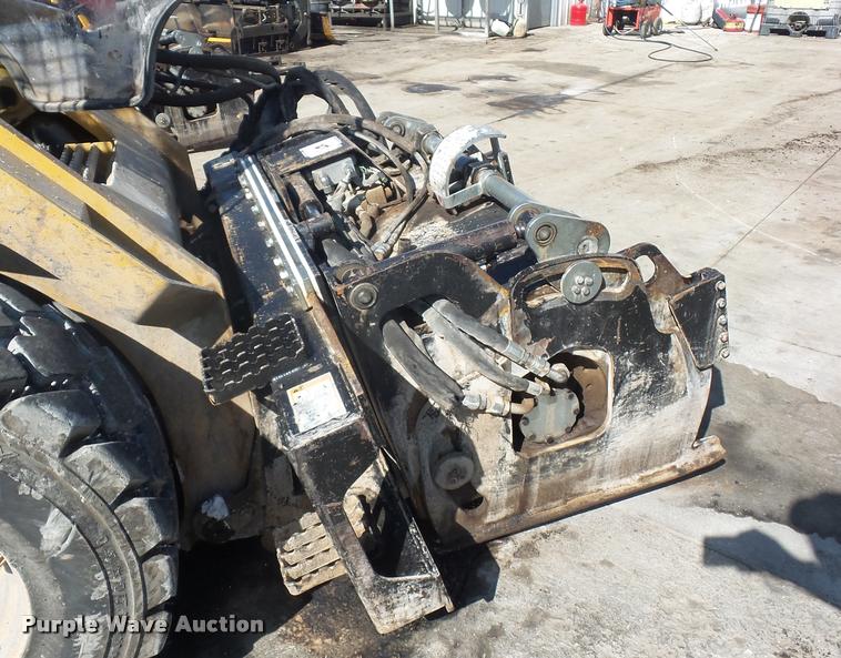 image for item L4603 2011 Caterpillar PC210 skid steer milling attachment