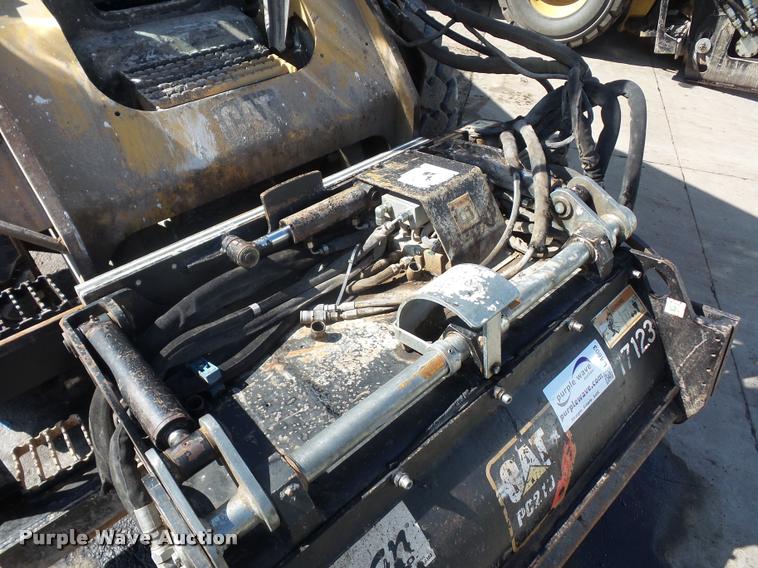 image for item L4603 2011 Caterpillar PC210 skid steer milling attachment