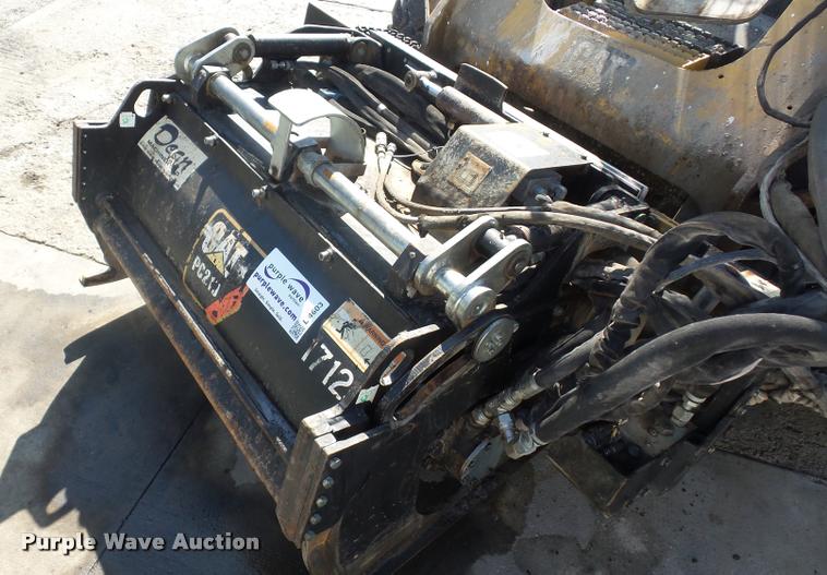 image for item L4603 2011 Caterpillar PC210 skid steer milling attachment