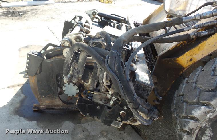 image for item L4603 2011 Caterpillar PC210 skid steer milling attachment