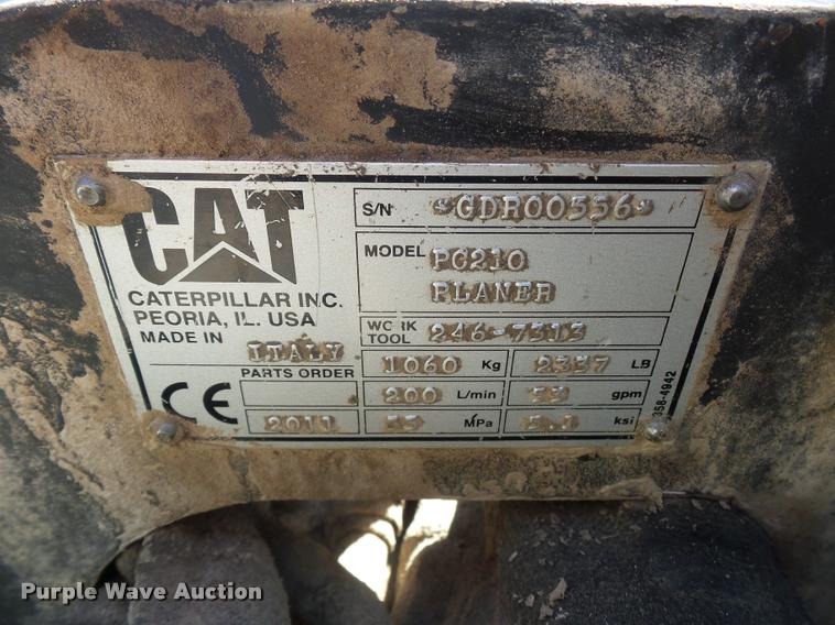 image for item L4603 2011 Caterpillar PC210 skid steer milling attachment